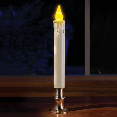 The Automatic Flameless Candles Hammacher Schlemmer A Built In Timer That Lights And