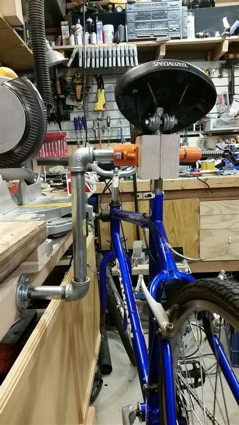 If you love to ride your bike but don't like to in winter because it is cold and wet or you want to ride at night but it is not safe to ride outdoors this is for you. diy bike stand | Bike stand, Bike, Stationary bike