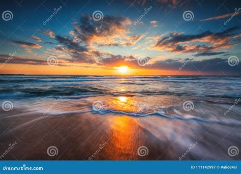 Sunrise Over The Sea And Beautiful Cloudscape Stock Image Image Of