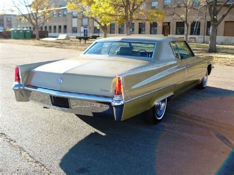 Vintage Review Cadillac Coupe Deville Golden Goose Curbside