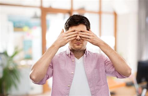 Man Closing His Eyes By Hands Over Office Room Stock Photo Image Of