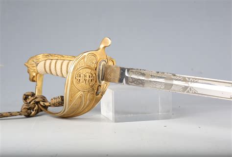 A Post 1952 Royal Navy Officers Dress Sword By Gieves With Single