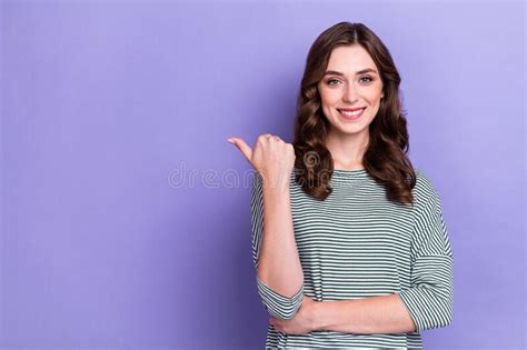 Photo Of Cute Girlish Woman Wear Striped Pullover Thumb Directing Empty