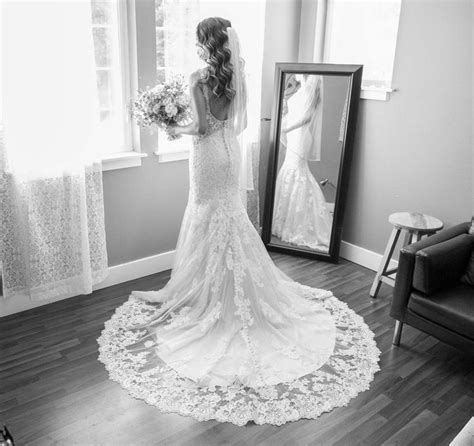 Bride In Gorgeous Lace Dress Getting Ready In Bridal Suite At Gorge Crest Vineyards Wedding
