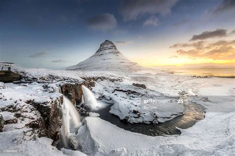 In The Morning Before Sunrise At Kirkjufell Mountain With Waterfall