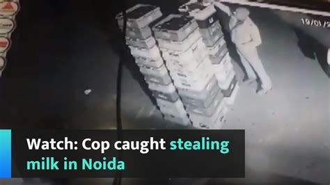 Watch Cop Caught Stealing Milk In Noida Youtube