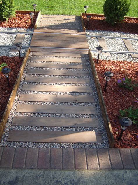 Walkway Crossing Tracks Used Cedar Deck Planks Held Together With 2x2