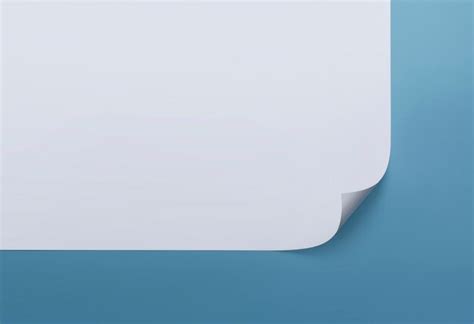 Página De Papel Blanco En Blanco Con Rizo Aislado En Azul Foto Premium
