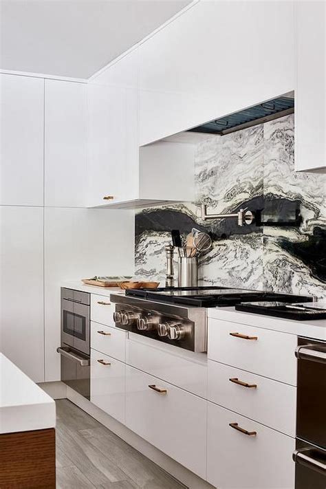The contemporary kitchen cabinets theme, therefore, you must take care when choosing kitchen cabinets to suit the subject. Beautiful contemporary kitchen features white flat front ...