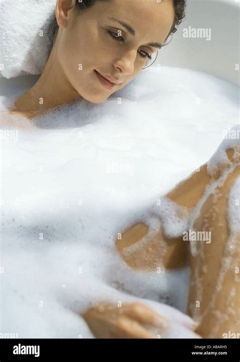 Woman Taking Bubble Bath Stock Photo Alamy