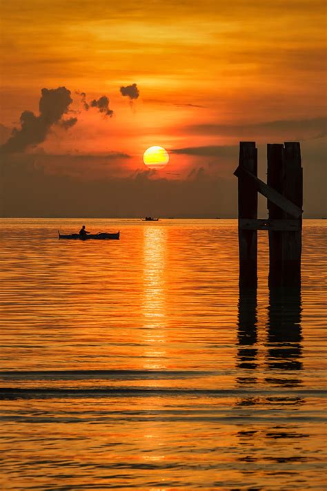 Sun Sunset Sea Boats Pier Hd Phone Wallpaper Peakpx