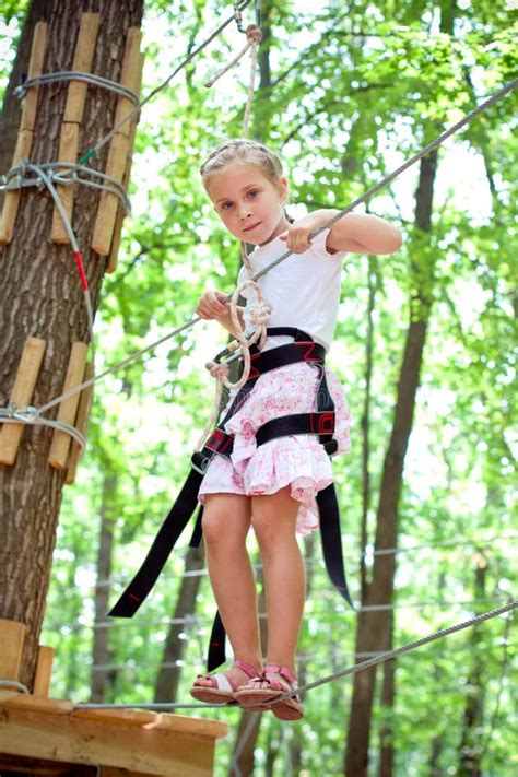 Young Girl Balancing On Rope Stock Photo Image Of Girl Challenge