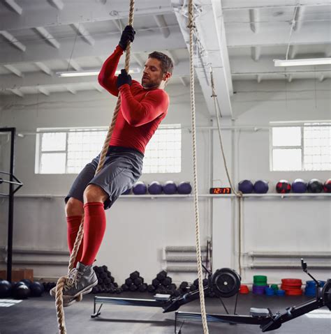 Fitness Rope Climb Exercise At Gym