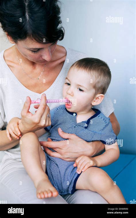 Child Taking Medication Stock Photo Alamy