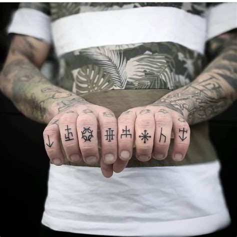 10 Cool Finger Tattoos For Men Finger Tattoo Design For Guys
