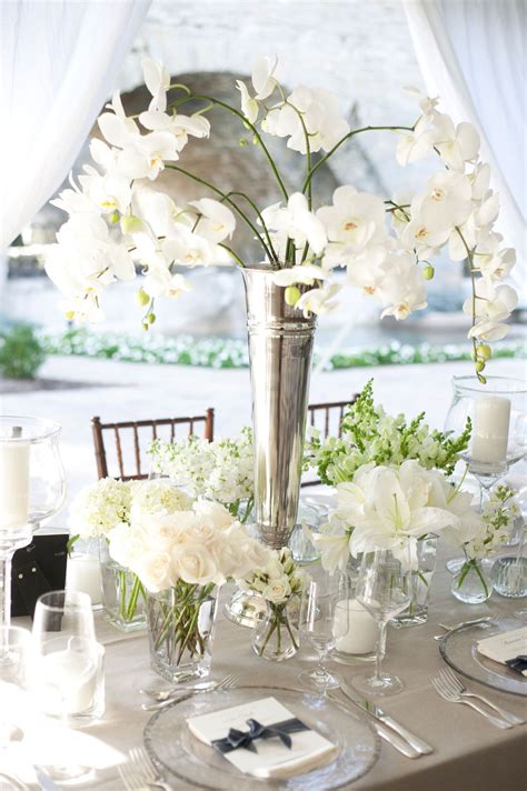 Tell our tbg professionals your ideas about the ideal arrangements for the orchids and the draping of silks and satins watch them transform a plain space into one in which you can have a. Interfaith Wedding with Soft, Neutral Color Palette in Cincinnati | White orchid centerpiece ...