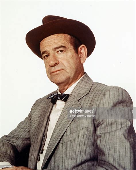 Walter Matthau Us Actor Wearing A Grey Striped Jacket With A White