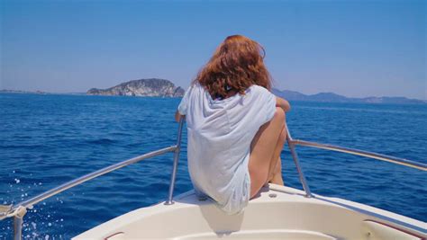 Young Attractive Woman Relaxing On A Sailing Yacht Girl Traveling And