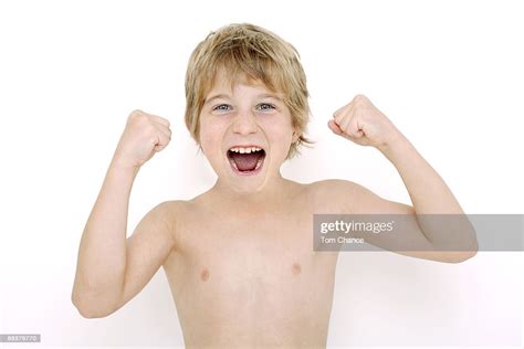 Boy Flexing Muscles Portrait Closeup Photo Getty Images