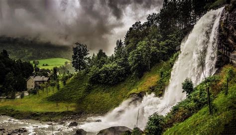 Waterfall In Norwegian Village