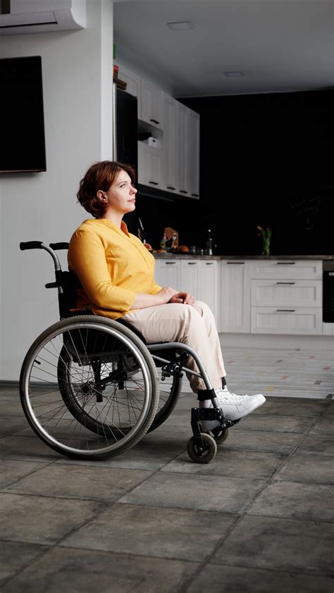 Woman Sitting In Wheelchair · Free Stock Photo