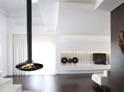These pieces add a hint of luxury to any room and can provide you with the perfect, decorative heating source! 15 Hanging And Freestanding Fireplaces To Keep You Warm ...