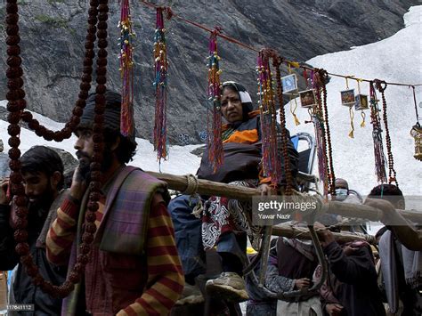 A Hindu Woman Is Carried By Palanquin Bearers As She Makes Her News Photo Getty Images