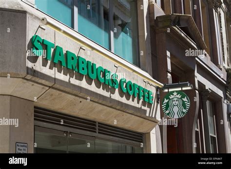Starbucks Coffee Sign Above Shop In The City Of London Stock Photo Alamy
