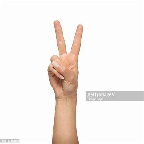 Holding Two Fingers Up Photos And Premium High Res Pictures Getty Images