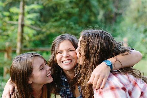 Happy Mother And Two Daughters Laughing By Stocksy Contributor Leah Flores Stocksy