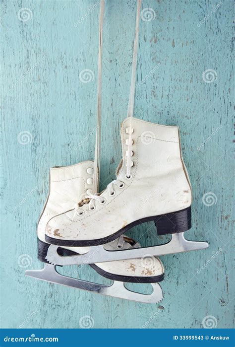 Pair Of Ice Skates On Blue Wooden Background Stock Image Image Of