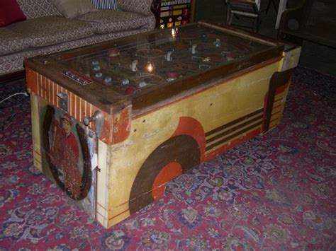 It can therefore easily be used on a small coffee table or buffet. Pinball machine coffee table. | Pinball