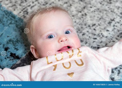 Baby Girl With Blue Eyes And Blonde Hair