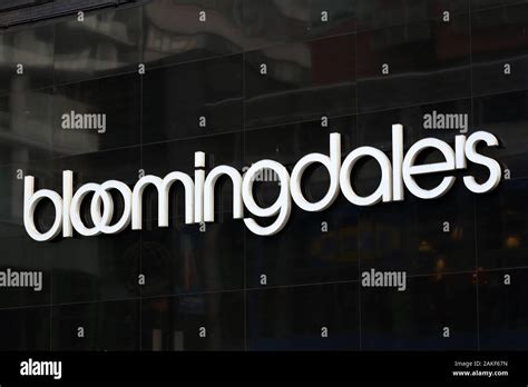 A Bloomingdales Logo Set Against A Black Wall At Their Department Store