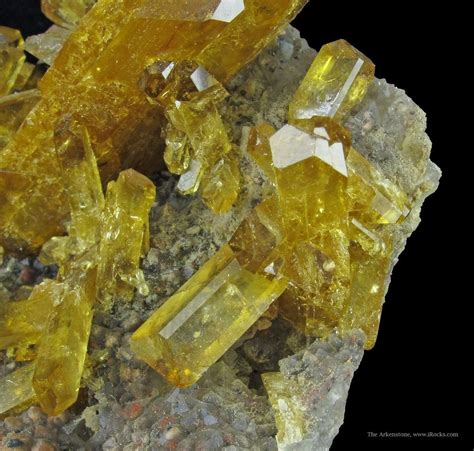 Intense Metallic Shimmery Baryte Crystals Of Deep Amber