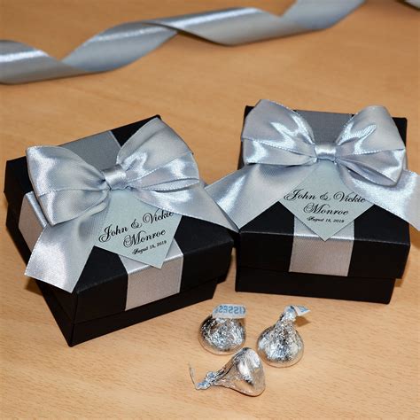 Check spelling or type a new query. Silver wedding favor gift box with satin ribbon bow and ...