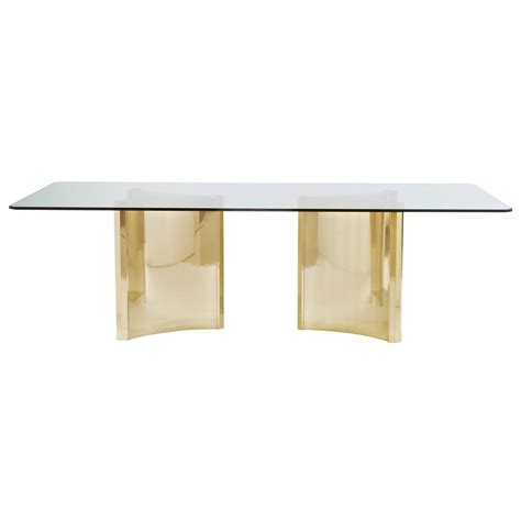 To complement this solid white oak table we built, our customer found fabric with a design they love for their head. Ellen Modern Sleek Gold Double Pedestal Glass Dining Table ...