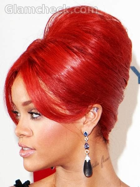 Singer Rihanna Sports The Fiery Red Top Bun Hairstyle