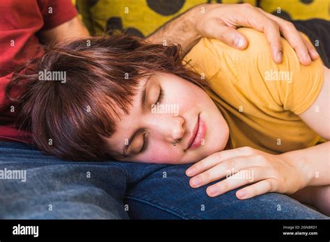 Woman With Bangs Sleeping On Babefriend S Lap At Home Stock Photo Alamy
