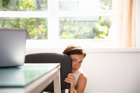 Frightened Businesswoman Hiding Behind Chair Easy Prey Podcast