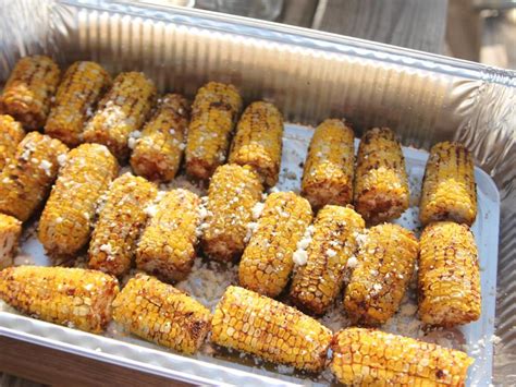 Lightly charred corn on the cob slathered in a creamy chili, lime sauce and topped with cilantro and cotija cheese is a great side to serve at any summer cookout. Street Corn Recipe | Ree Drummond | Food Network