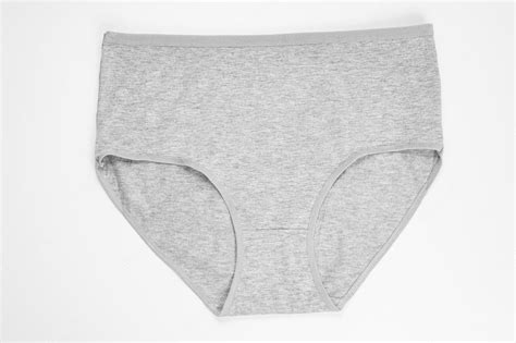 Premium Photo A Gray Cotton Panties On A White Background
