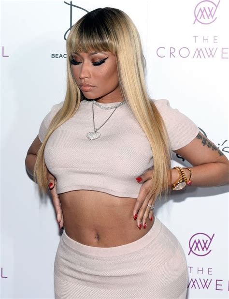 Nicki Minaj Squeezes Her Famous Curves Into A Skintight Crop Top And
