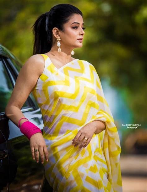Priyamani Styles Her Bright Saree With A Contrast Accessory Check It Out