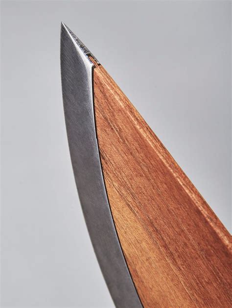 This Sleek Wood Chef Knife Is Combined With Alloyed Carbon Steel