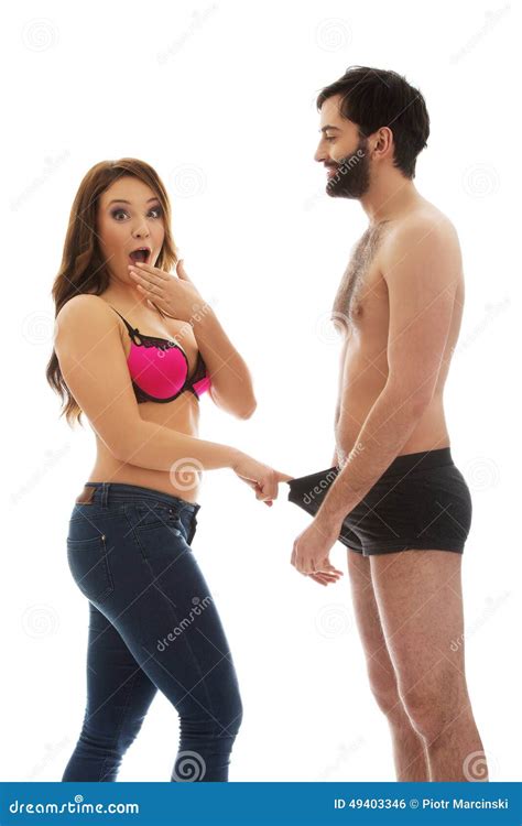 Surprised Woman Looking Into Man S Panties Stock Photo Image