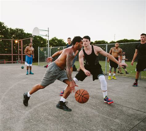 Two Young Men Playing Street Basketball