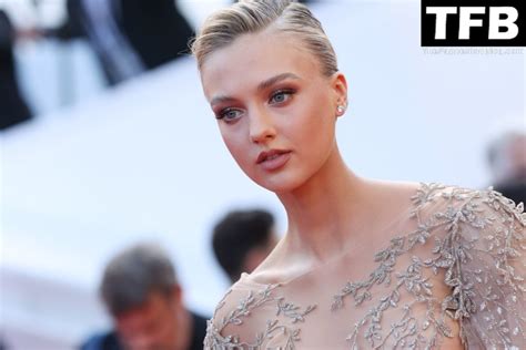 Lilly Krug Poses In A See Through Dress At The 75th Annual Cannes Film