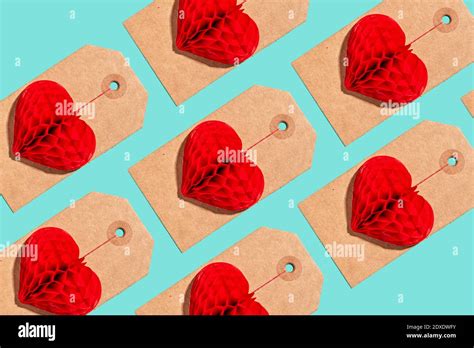Pattern Of Labels With Heart Shaped Paper Craft Decorations Stock Photo