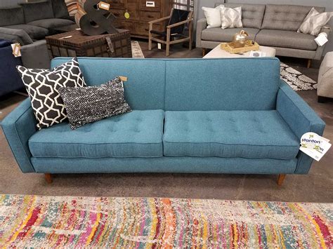 Furniture Outfitters Teal Tight Back Couch